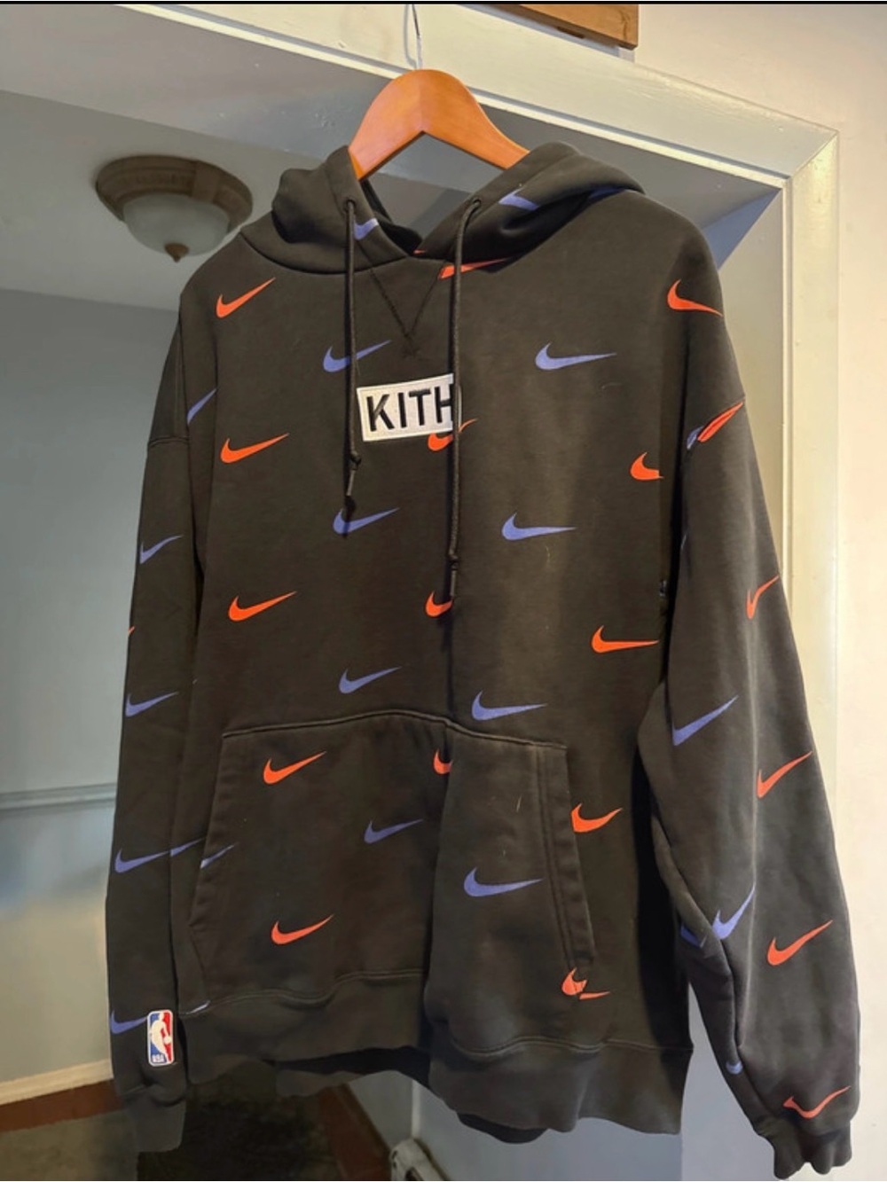 Kith Black Hoodie with Orange & Purple Nike Swoosh Print